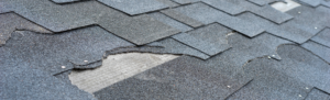 broken shingles on roof