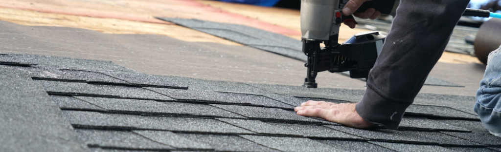 roofer installed shingles on roof